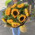 Букет 9 подсолнухов в крафте в Москве Букет 9 подсолнухов в крафте в Москве